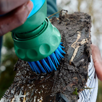 Travel friendly shoe cleaning tool handheld device