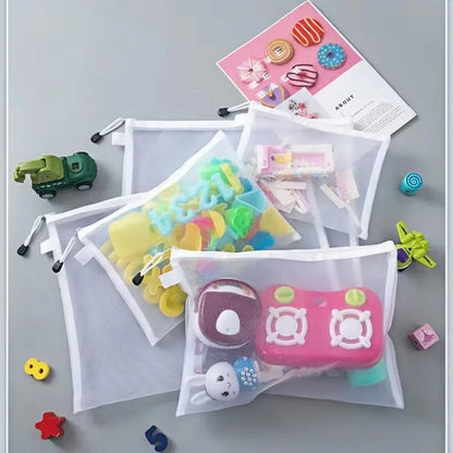 Compact mesh toy storage bags for travel and home