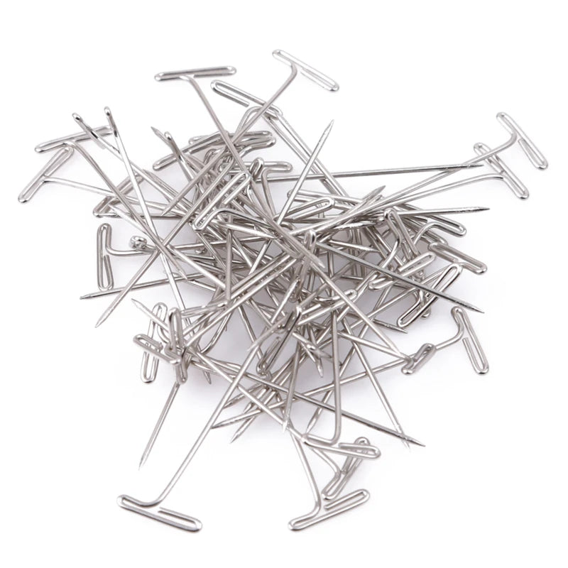 T pins wig block canvas head securing foam craft close up