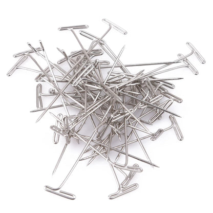 T pins wig block canvas head securing foam craft close up