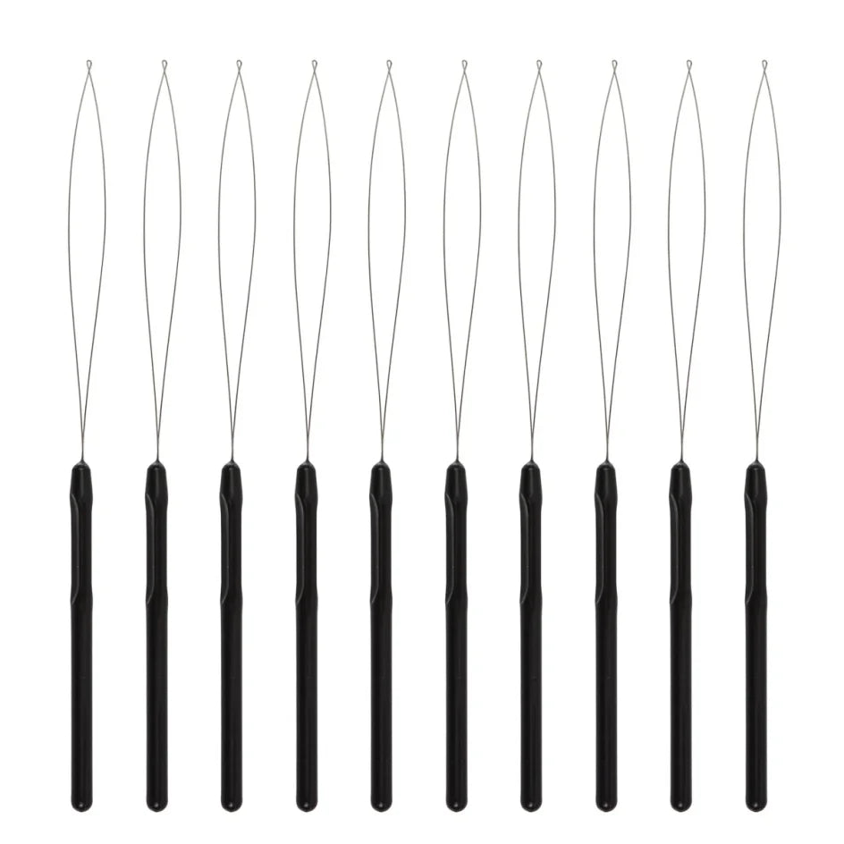 Hair extension loop needle tool in use threading through bead